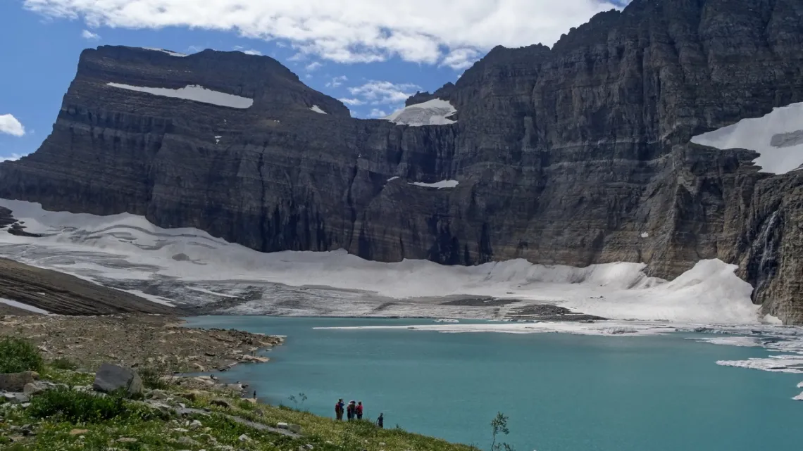 Looking SE across Grinnell Lake with remnants of Grinnell Glacier across the lake.