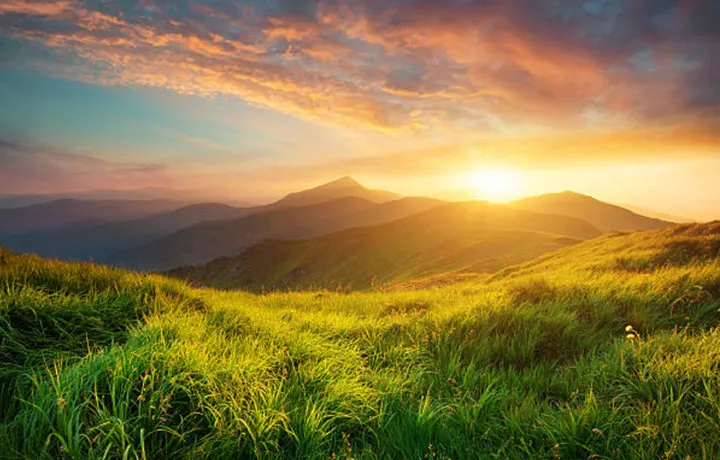 Sunset behind mountain