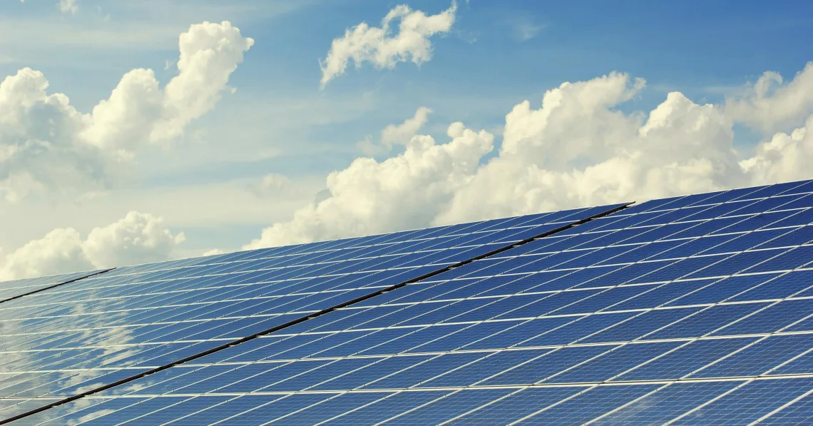 Solar panels against blue sky