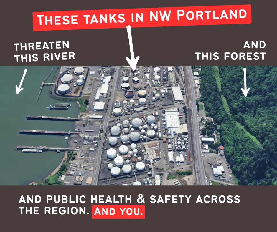 An aerial photograph of dozens of fuel storage tanks on the banks of the Willamette River.