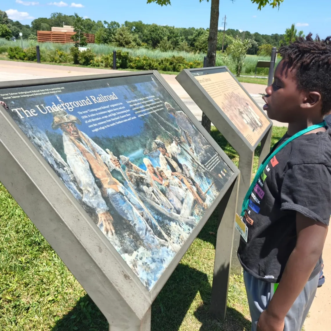 Dylan reads about the Underground Railroad at the Harriet Tubman Underground Railroad National Historical Park in Maryland.