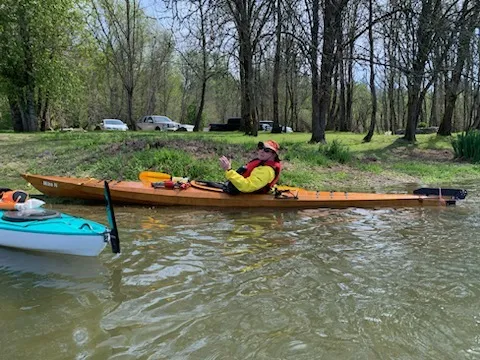 Lehman Holder, Outings Chair, in kayak