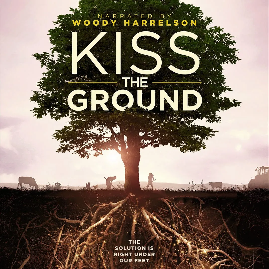 Image of Tree with roots visible, text Kiss the Ground in Kanopy