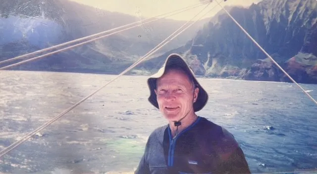photo of Charlie Wilson on a lake in the mountains