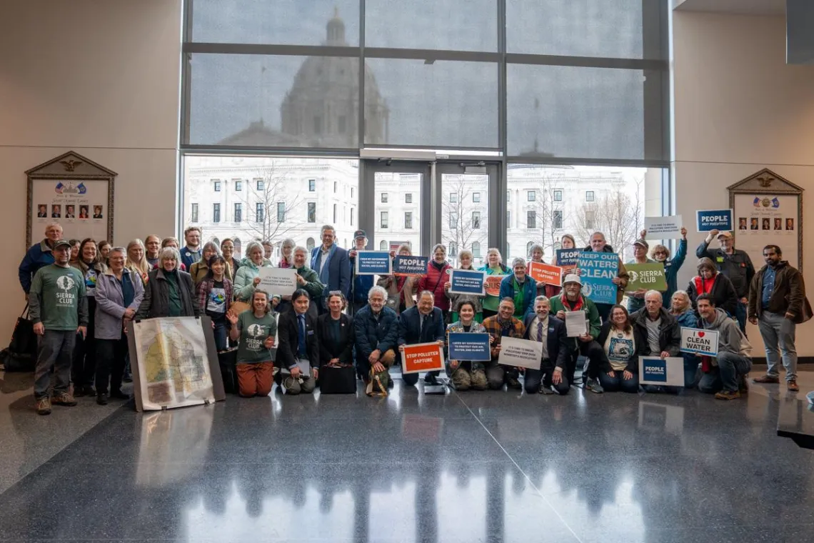 Group photo with attendees following the hearing. Photo by Devon Young Cupery