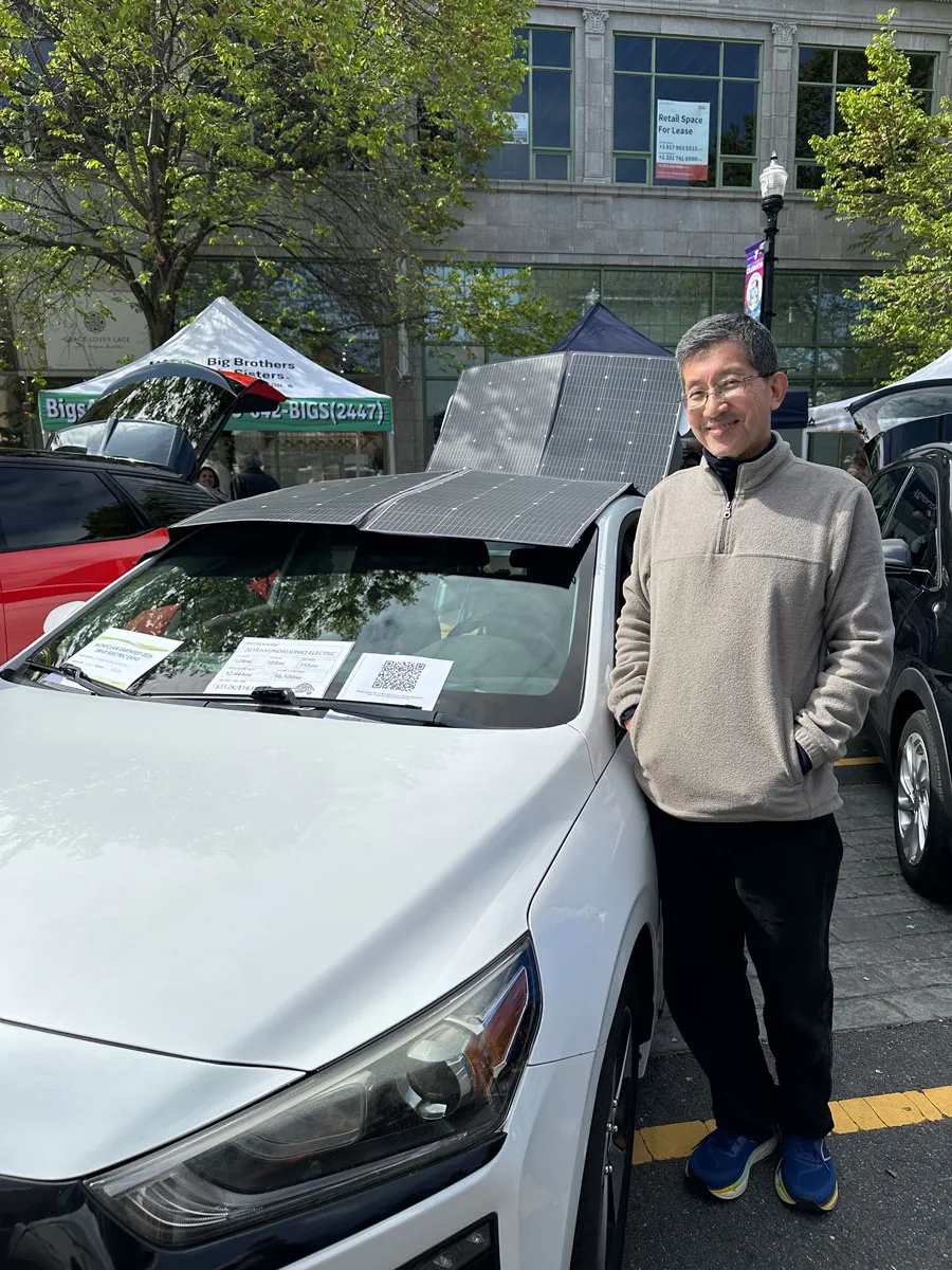 David Kim of Hillsboro NJ displaying his Hyundai Ioniq5 with portable solar panels that can help charge the battery and run accessories
