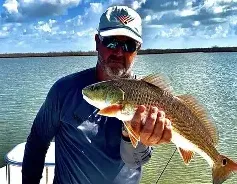 Grahame Jones with  a fish