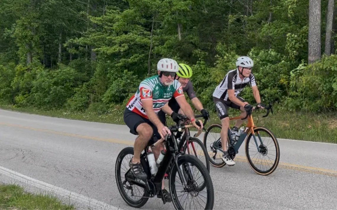 A group of three bikers riding along the route of Enbridge's Ridgeline pipeline in Tennessee.