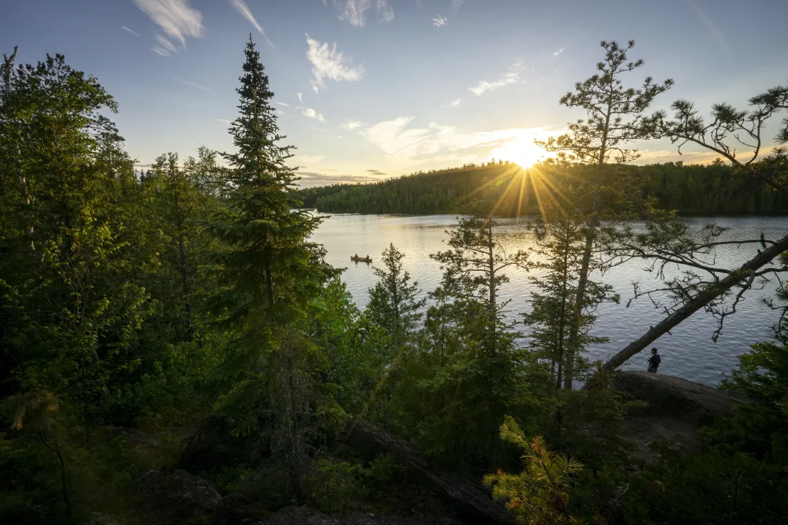 Sunshine over a lake in the Boundary Waters Canoe Area Wilderness. Photo credit: Alec Olson