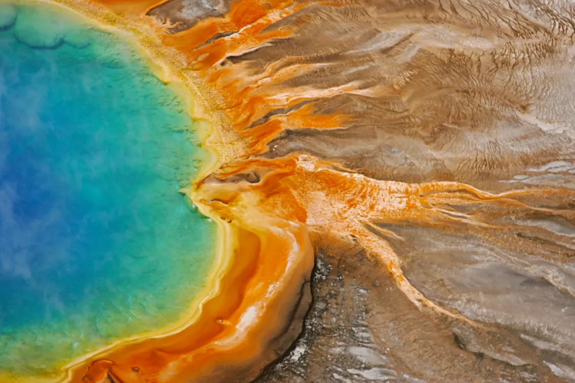 The Grand Prismatic Spring, located in Midway Geyser Basin, has the distinction of being Yellowstone’s largest hot spring.