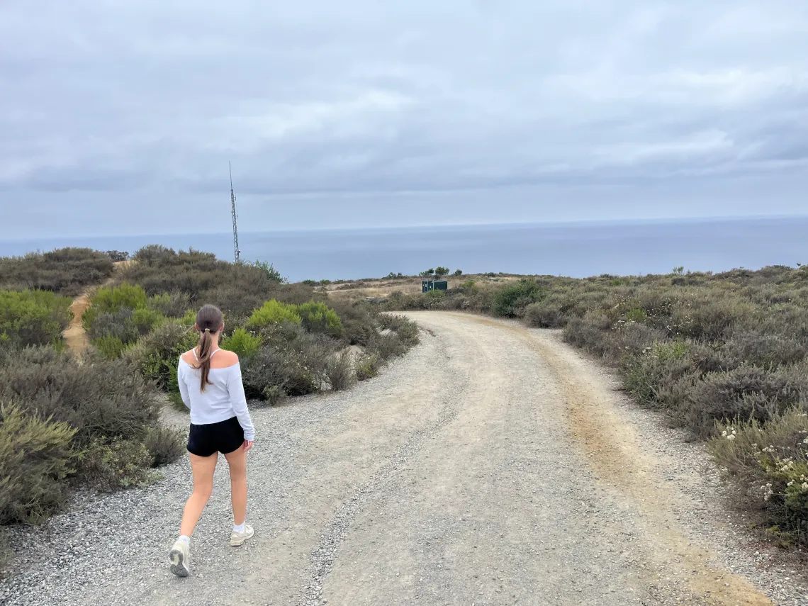 Girl (Charlotte Peterson) hiking in Laguna Beach, California 