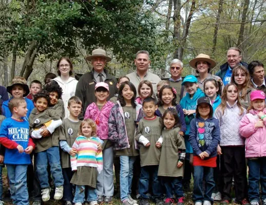 Group of kids and adults, including park rangers