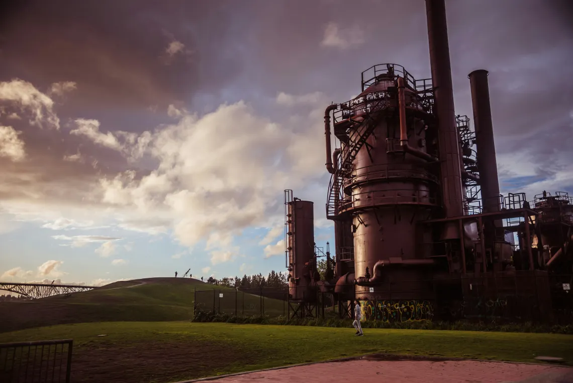 An industrial plant at sunset.