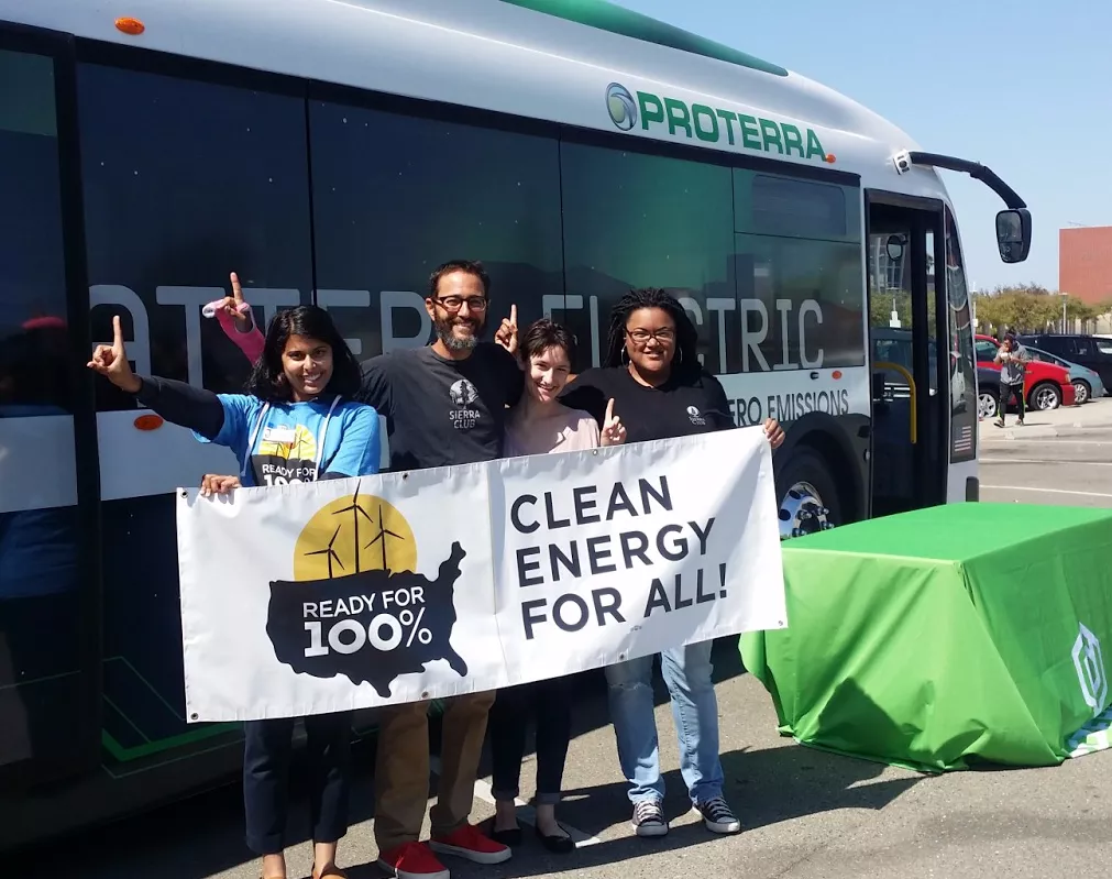 Electric bus photo Sierra Club with banner.png