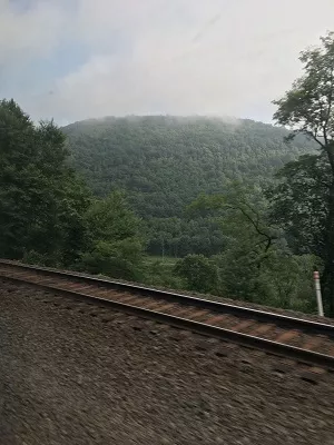 View of Appalachians and railroad track from an Amtrak train, 2019