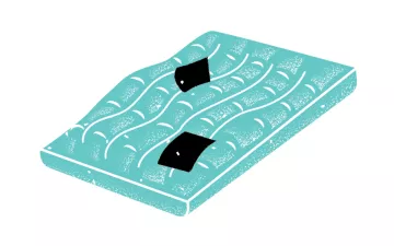 Black and teal illustration of a mattress with two patches.