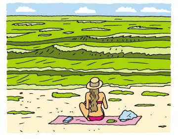 woman sitting in a beach covered in algae