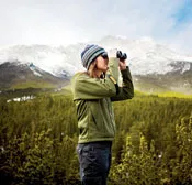 Jennifer "Nifer" Wilkening scans the landscape for evidence of elusive, Mickey Mouse–eared pikas.
