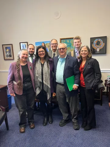 Photo of advocates with Rep. Tlaib