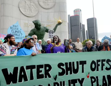 individuals in detroit protesting water shutoffs