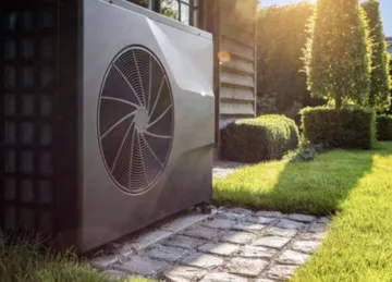 image of heat pump outside of home. 