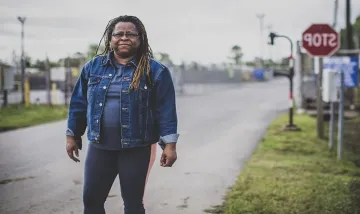 Lynn Godfrey standing in a street