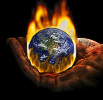 Earth burning in hand