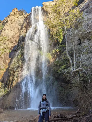 Janelle by a waterfall