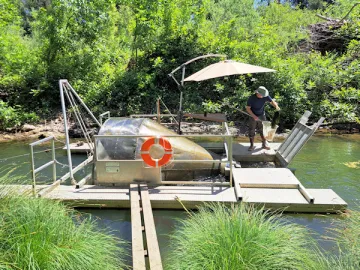 Helena at RCD Fish Monitoring station on Napa River