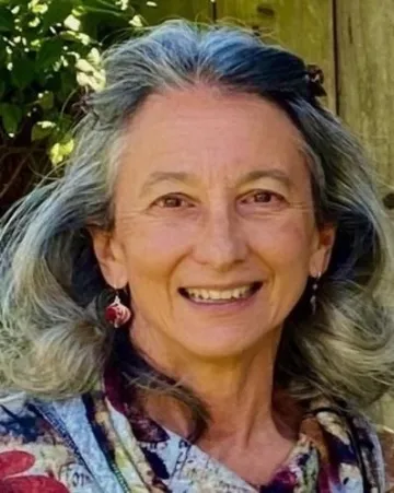 Peggy da Silva, smiling