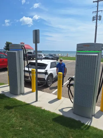 Alex charging a car in Tawas City MI
