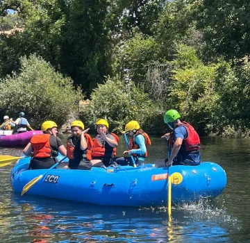 DFS Rafting - Boats on still water.