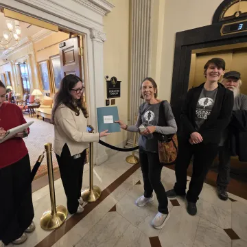 Delivering our petition to Governor Healey's office
