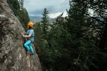 Picture of a woman rock climbing outdoors