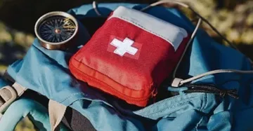 Picture of a first aid kit on a backpack