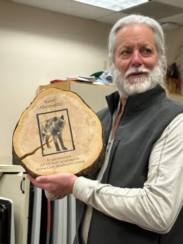 Kent Abernethy holds Appreciation Gift