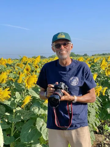 Roland Dumas with camera