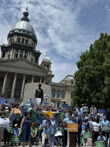 Christine Nannicelli leads rally May 30th as over 500 Illinoisans demand action on the POWER Act
