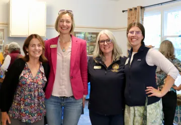 Four women at the Roadless Rule town hall
