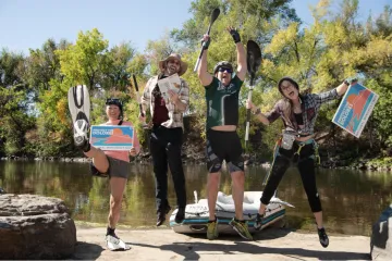 A group of Sierra Club volunteers jumping up with joy! 