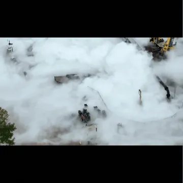 Video shows white plumes of gas leaking out of an excavation site