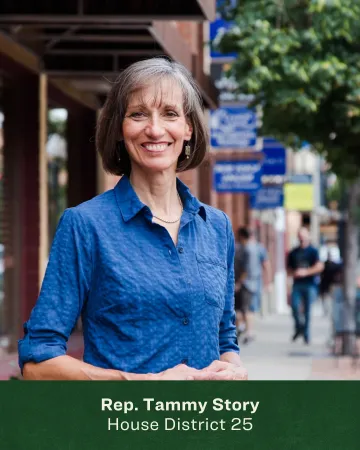 Headshot of Tammy Story in front of a busy street