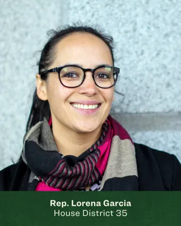 Headshot of Lorena Garcia in front of a concrete wall 