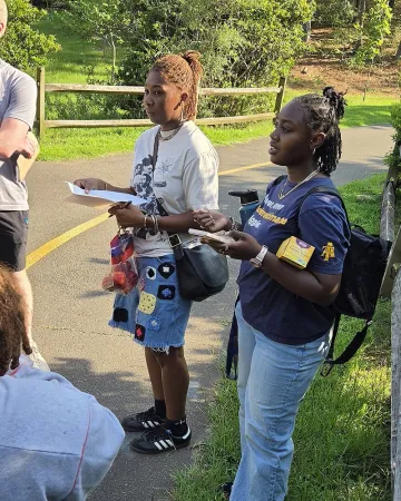 Genesis describes native trees to participants in her outing at the Cary Tree Archive