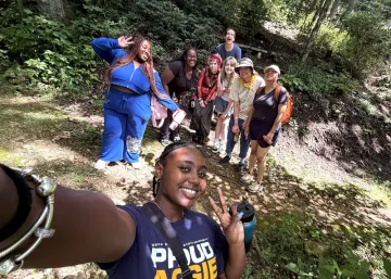 2026 summer fellows Genesis and Kierra pose with SPROG outing participants