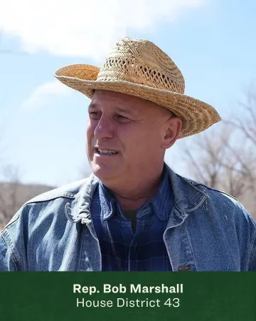 Headshot of Bob Marshall in a straw hat 