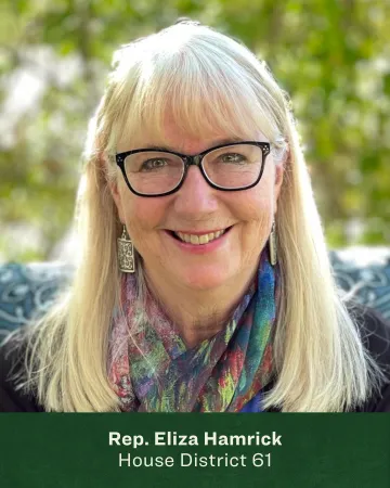 Headshot of Eliza Hamrick in front of greenery 