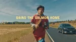 boy running on side of road
