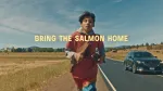 boy running on side of road