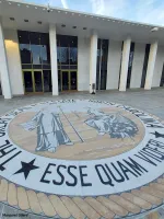 The state seal of North Carolina on the walkway outside the Legislative Building